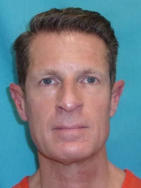 Darrell Crall was accused of physically assaulting his girlfriend.